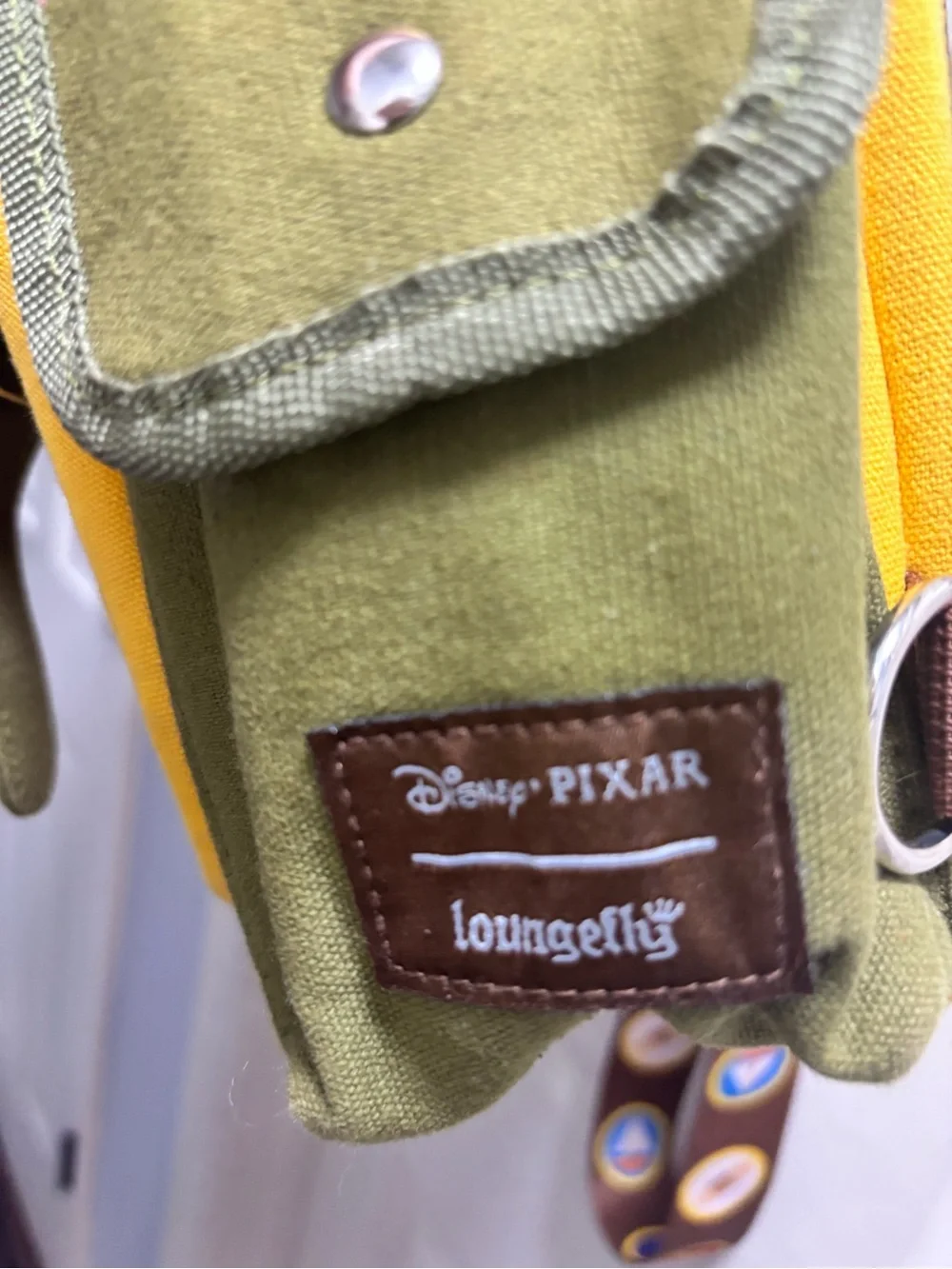 Disney Loungefly full-sized Wilderness Explorer backpack with one strap